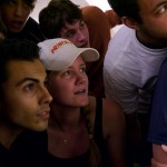 2012 Men's College Squash Association National Team Championships: Princeton and Trinity players watch the final match